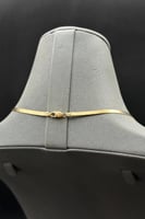 عقد فلات مع تعليقة حدوة الحصان ذهب صافي عيار 18 وز...