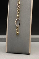 اسوارة دوائر ذهب صافي عيار 18 وزن 3.4 جرام