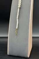 اسوارة لؤلؤ مع ذهب بالمنتصف عيار 18 وزن 1 جرام