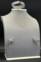 طقم فراشة ذهب صافي عيار 21 وزن من 1.4 الى 1.5 جرام