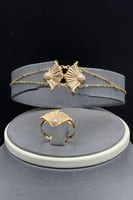 طقم رموش ذهب مع صدف ابيض عيار 21 وزن من 8.5 الى 8....