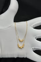 عقد دورين كور ذهب صافي عيار 21 وزن من 1.2 الى 1.3...