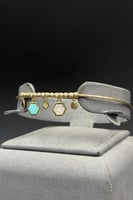 عقد مع اسوارة شكل خلية ذهب ايطالي عيار 18 وزن 15.9...