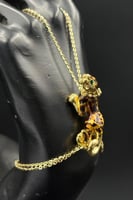 كف تايجر ذهب مع صدف اخضر عيار 18 وزن 10.3 جرام