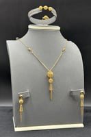 طقم ذهب صافي عيار 21 وزن 11.7 جرام