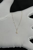 عقد وردة مفرغ ذهب تصميم الماس عيار 18 وزن 0.3 جرام