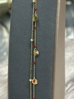 اسوارة ذهب عيار 18 شوطين شكل سداسي ملون بتصميم فخم