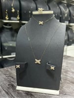 طقم شكل اكس ذهب تصميم الماس