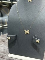 طقم شكل اكس ذهب تصميم الماس