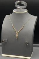 طقم خلية ذهب تصميم الماس عيار 18 وزن 8.1 جرام