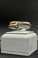 اسوارة مع خاتم مسمار ذهب صافي عيار 18 وزن 12.9 جرا...