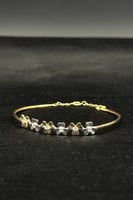 اسوارة اطفال وردات ذهب تصميم الماس عيار 18 وزن من...