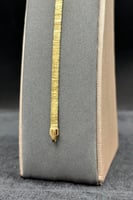 اسوارة حرير ( حجم صغير ) ذهب صافي عيار 18 وزن من 4...