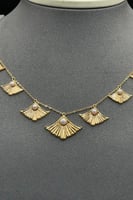 طقم رموش ذهب مع صدف ابيض عيار 21 وزن من 8.5 الى 8....