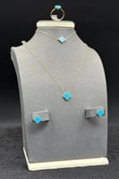 طقم وردة ذهب مع صدف فيروزي عيار 18 وزن من 2.7 الى...