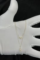 عقد مستطيل دورين ذهب تصميم الماس عيار 18 وزن من 0....