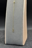 اسوارة كور ذهب صافي عيار 18 وزن 0.4 جرام