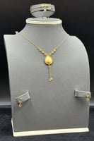 طقم ذهب صافي عيار 21 وزن 5.6 جرام