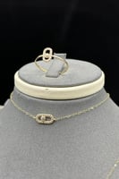 طقم دورين مستطيل ذهب تصميم الماس عيار 18 وزن 2.2 ج...