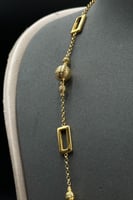 عقد كور مع مستطيلات ذهب صافي عيار 21