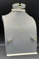 طقم مثلث ذهب تصميم الماس عيار 21 وزن من 2 الى 2.1...