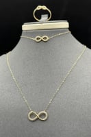 طقم انفنتي ذهب عيار 18 وعد اللانهاية وزن 2.6 جرام