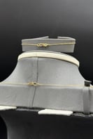 طقم دورين ذهب صافي عيار 21 وزن 2.9 جرام