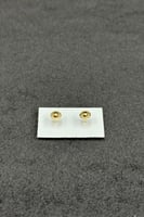 حلق طبي ذهب صافي عيار 18 وزن 0.3 جرام