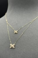 عقد شكل X دورين ذهب تصميم الماس عيار 18 وزن من 0.8...