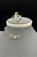 طقم ذهب صغير عيار 18 نقاط الأناقة وزن من 3 إلى 3.1...