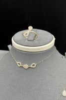 طقم ذهب عيار 18 قطرات الرقي وزن 2.85 جرام