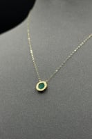 عقد شكل دائري مع اسوارة ذهب مع صدف اخضر عيار 18 وز...