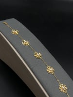 اسوارة ذهب عيار 21 تصميم رموش ملونة بجاذبية دائمة