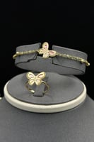 طقم فراشة ذهب مع صدف وردي وابيض عيار 18 وزن 12.6 ج...