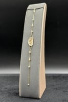 اسوارة شناف ذهب مع لؤلؤ عيار 18 وزن 2.15 جرام