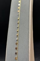 اسوارة دوائر مع كور ذهب صافي عيار 18 وزن من 2.1 ال...