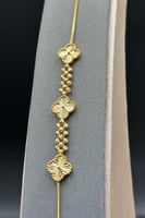 اسوارة ثلاث وردات ذهب صافي عيار 21 وزن من 5.5 الى...