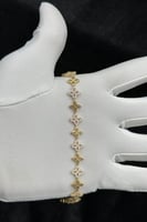 اسوارة زهرات ذهب تصميم الماس عيار 18 وزن 7 جرام