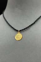 تعليقة ذهب صافي عيار 21 وزن من 0.4 الى 0.5 جرام