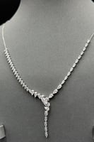 طقم ذهب ابيض ناعم عيار 18 بتصميم الماس وزن 14 جرام