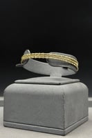 اسوارة مع خاتم ذهب صافي عيار 18 وزن من 6.3 الى 6.4...