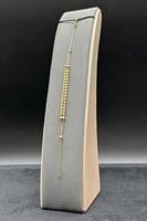 اسوارة شوطين مجدول لونين ذهب صافي عيار 18 وزن من 1...