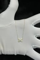 عقد اكس ذهب تصميم الماس عيار 18 وزن من 0.8 الى 0.9...