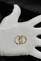 حلق مبروم ذهب صافي ايطالي عيار 18 وزن 1.4 جرام