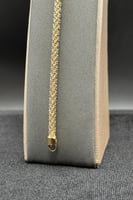 عقد مع إسوارة ذهب صافي عيار 18 فخامة أورلين وزن 32...