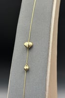 اسوارة قلبين ذهب صافي عيار 18 وزن 0.9 جرام