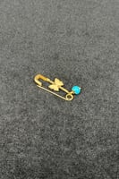 بروش اطفال فراشة ذهب مع صدف فيروزي عيار 21 وزن 0.7...