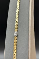 اسوارة ذهب مع باقيت تصميم الماس عيار 18 وزن 8.5 جر...