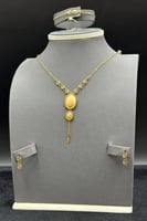 طقم ذهب صافي عيار 21 وزن 6.9 جرام