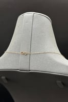 عقد الماس وزن الذهب وزن الذهب : 0.8 جرام وزن الألم...